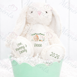 Personalised White Fluffy Bunny Plush with cute bunny 2026 image on the chest, with the words "My First Easter" in the banner above. The name Vinnie appears underneath and on the feet are the words "Love, Mummy & Daddy" and "2026" 