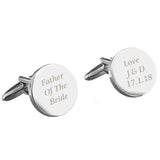 Silver cufflinks with engraved text on a white background