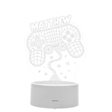 Gaming controller lamp with 'Matthew' text on a white background