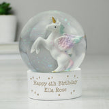 Unicorn figurine inside a snow globe with 'Happy 6th Birthday Ella Rose' on a white base.