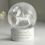Personalized snow globe with a horse figure and engraved text on a neutral background