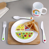 Lifestyle image of personalised plastic healthy eating cutlery set featured alongside matching plate and mug.