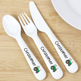 Personalized white cutlery set with 'Christopher' and tractor design on a wooden surface
