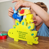 Child playing with a colorful dinosaur-shaped toy