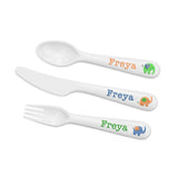 Set of white cutlery with 'Freya' and elephant design on a white background