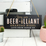 Personalised Black Slate Hanging Sign featuring the words "You are Beer-Illiant" followed by the name Grandad Nigel and a message below reading "love from Sarah xx"