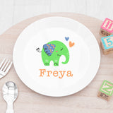 A personalised kids' elephant plastic plate with the name 'Freya' on it, featuring a colorful elephant design.