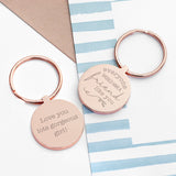 Personalised Rose Gold Friendship Keyring. Image shows both sides of the same keyring. One side has the wording "Everyone should have a friend like you" and the other side has a personalised message, reading "Love you lots gorgeous girl!"
